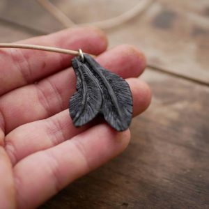 Federn aus Mooreiche